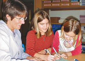 photo of Christine Kugler with her daughters Kaitlyn and Madisyn