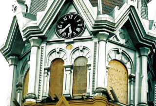 photo of clock on St. Raphael Cathedral spire in Madison